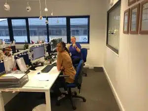 Christina Clegg office christmas decorations and team